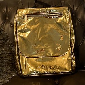 Tote&Carry Gold Backpack